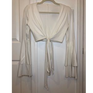 White wrap crop top with long flared bell sleeves